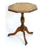A 19thC and later walnut games table, the octagonal top inlaid with mahogany & ash chequerboard,