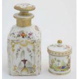 Two Continental lidded ceramic containers; a small pot decorated with hand painted birds,