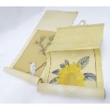 Two oriental hand painted scrolls one depicting a sunflower, one depicting a white,