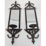 A pair of mirrored sconces CONDITION: Please Note - we do not make reference to the