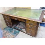 A 1950s desk with green leather insert to top CONDITION: Please Note - we do not