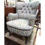 A small upholstered wingback armchair CONDITION: Please Note - we do not make