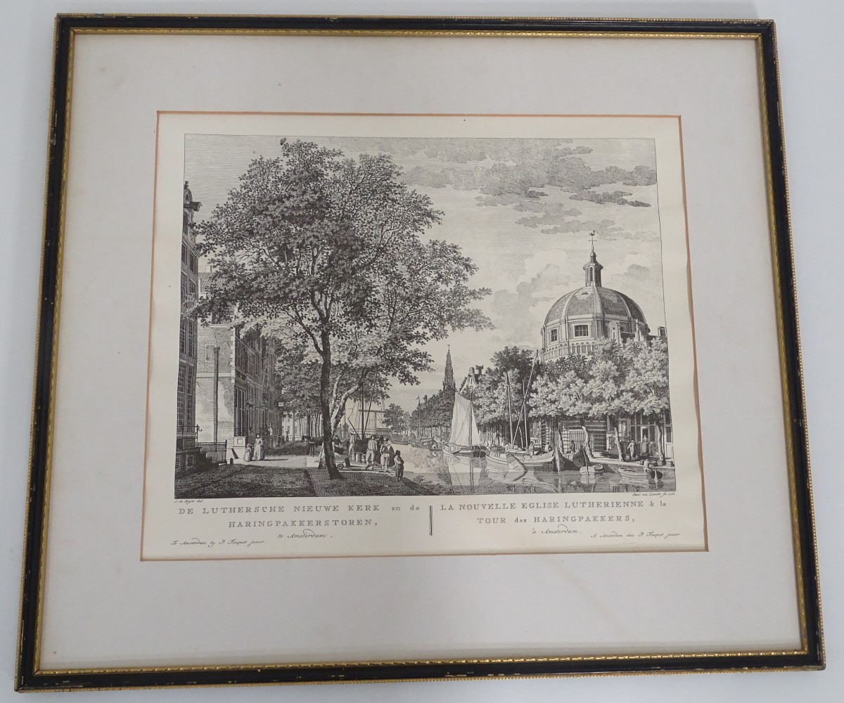 A framed print of a street scene in Amsterdam CONDITION: Please Note - we do not