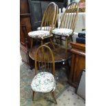 An Ercol vintage / retro dining table and matching chairs CONDITION: Please Note -
