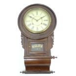American Regulator wall clock: a walnut cased chisel point sprung 'Regulator' 8-day wall clock with