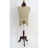 Dressmakers dummy, a mannequin on a tripod stand. 53" high.