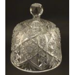 A cut glass dome cover with facet cut knop handle approx 6 1/4" high.