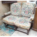 A Parker Knoll two-seater sofa with floral upholstery CONDITION: Please Note - we