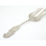 A Continental white metal spoon marked Sola 5” long CONDITION: Please Note - we