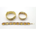 3 assorted bracelets including a yellow metal chain link bracelet,