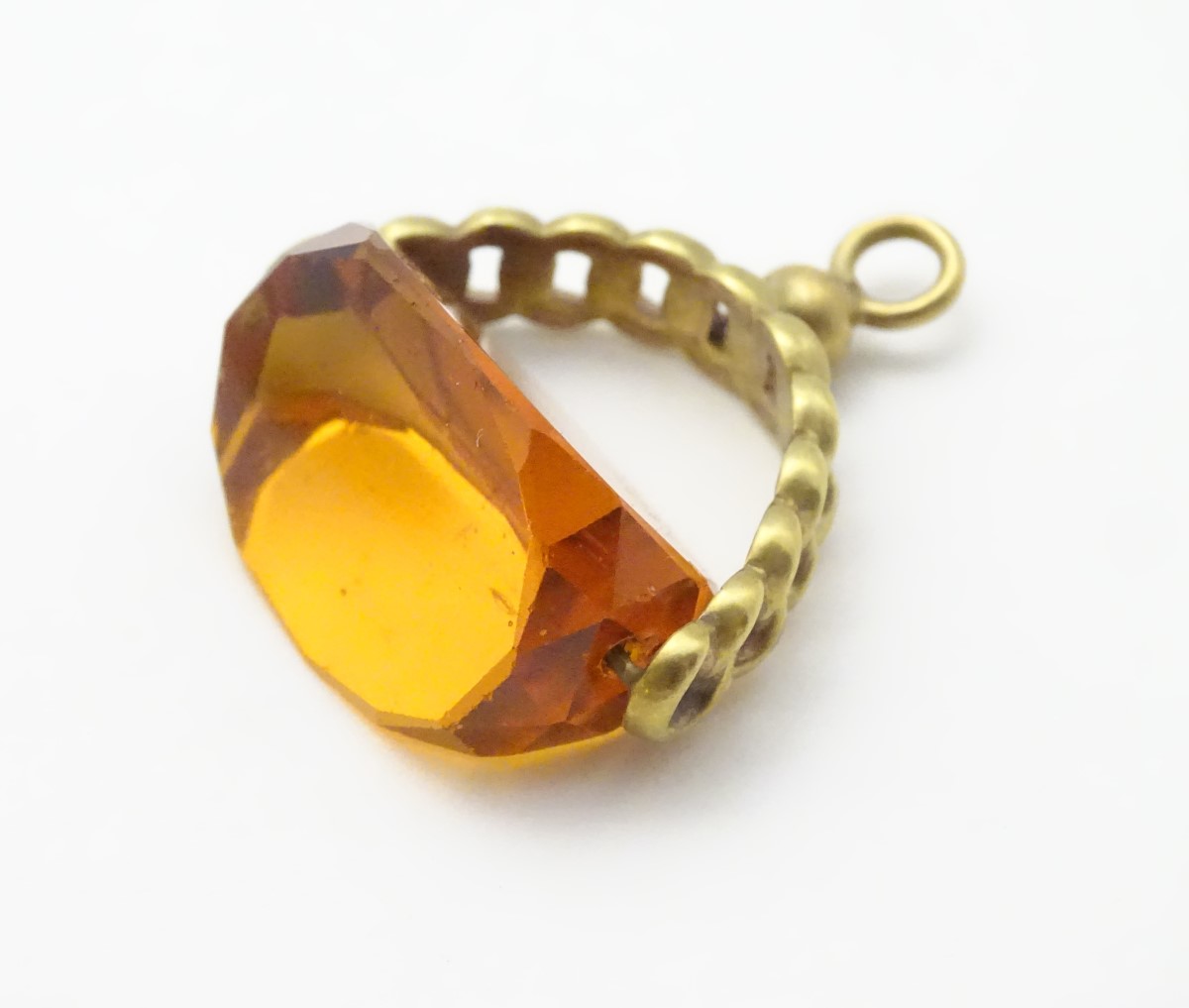 A pendant fob with central rotating citrine paste stone 1 ½” long CONDITION: Please - Image 4 of 9