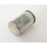 A novelty pendant charm of cylindrical form and containing a £1 note.