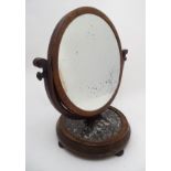 A mid / late 19thC mahogany toilet mirror,