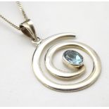 A silver pedant set with oval topaz with a chain 18" long CONDITION: Please Note -