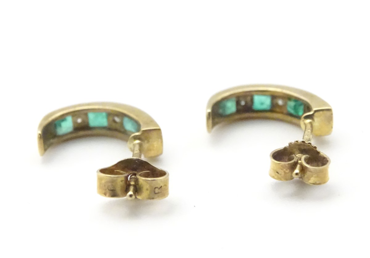 A pair of 9ct gold earrings set with diamonds and emeralds. - Image 10 of 11