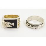 Two Gentleman's silver rings,