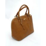 A new Paul Costelloe 'The Bughatti' leather bag in tan colour, with detachable strap, 14 1/2'' wide,