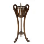 A 20thC mahogany planter / plant stand with a bulbous slatted top decorated with three swans heads