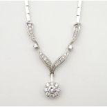 An 18ct white gold necklace set with diamonds ( totalling approx 1.4ct) approx 15" long .