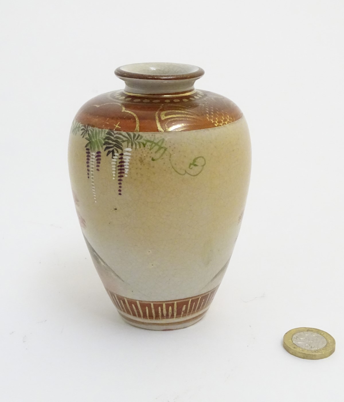 A small Japanese satsuma vase depicting figures in a garden, with gilt highlights. - Image 8 of 8