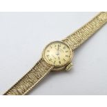 A ladies Rotary wristwatch, with a 9ct gold bracelet.