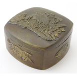 A small Japanese? box with applied relief decoration of cranes.