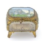 A Victorian jewel casket / trinket box with bevelled glass panels and gilt metal mounts.
