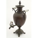 A 19thC copper samovar, of classical urn form with milk glass handles,