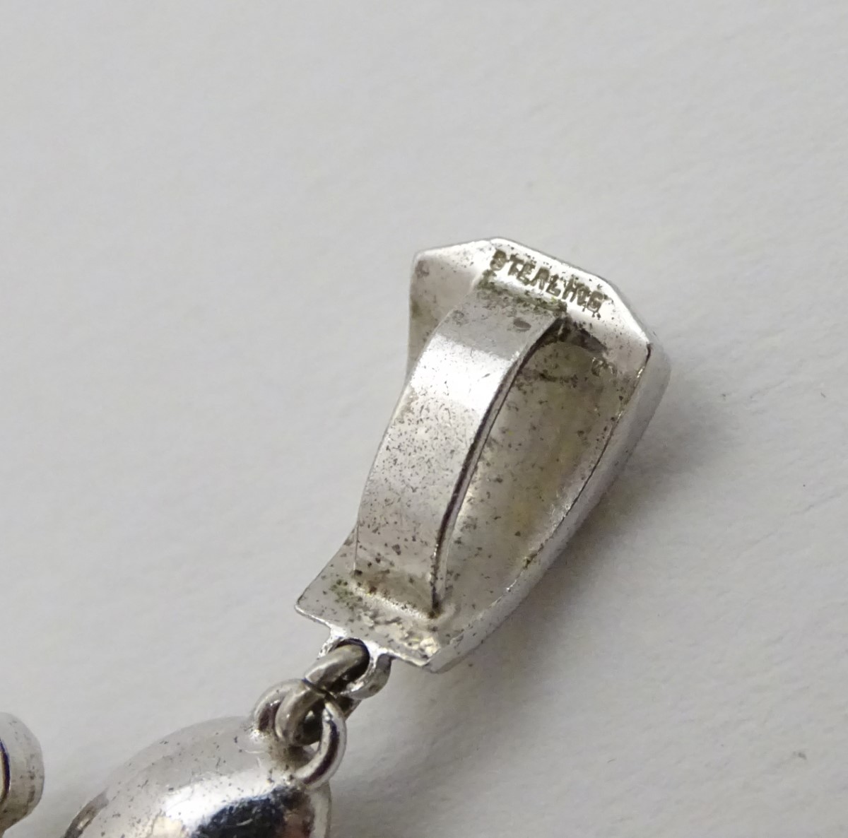 A white metal pendant set with paste stones 1 3/54" long CONDITION: Please Note - - Image 3 of 9