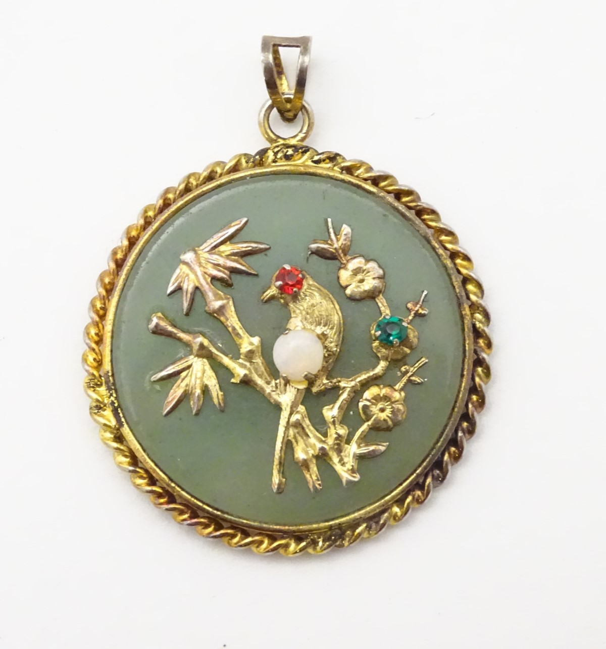 An Oriental pendant of circular form set with jadite stone to centre with bird and foliate - Image 6 of 10