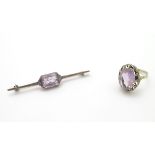 A Continental 835 silver gilt ring set with central amethyst ( the amethyst approx 3/4" long)
