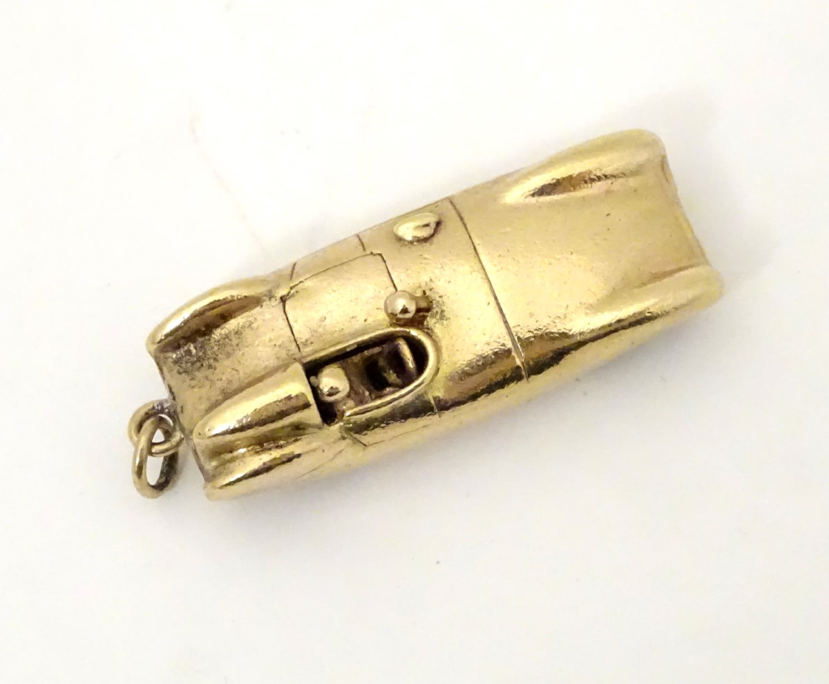 A gold vintage pendant / charm formed as an early racing car 1 1/8" long CONDITION: - Image 3 of 9