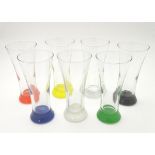 A collection of seven mid 20thC hi-ball drinking glasses with coloured bases,
