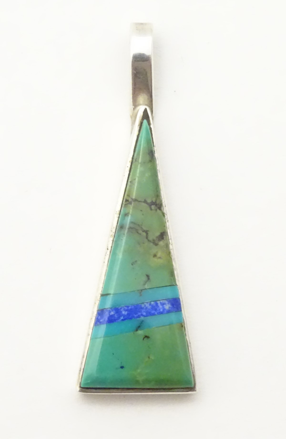 A Navajo silver pendant of triangular form set with turquoise. - Image 7 of 8