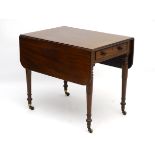 A mid 19thC mahogany Pembroke table with single long drawer, standing on ring turned tapering legs,