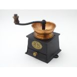 A late 20thC / early 21stC cast iron coffee bean mill / grinder. Approx. 5" high.