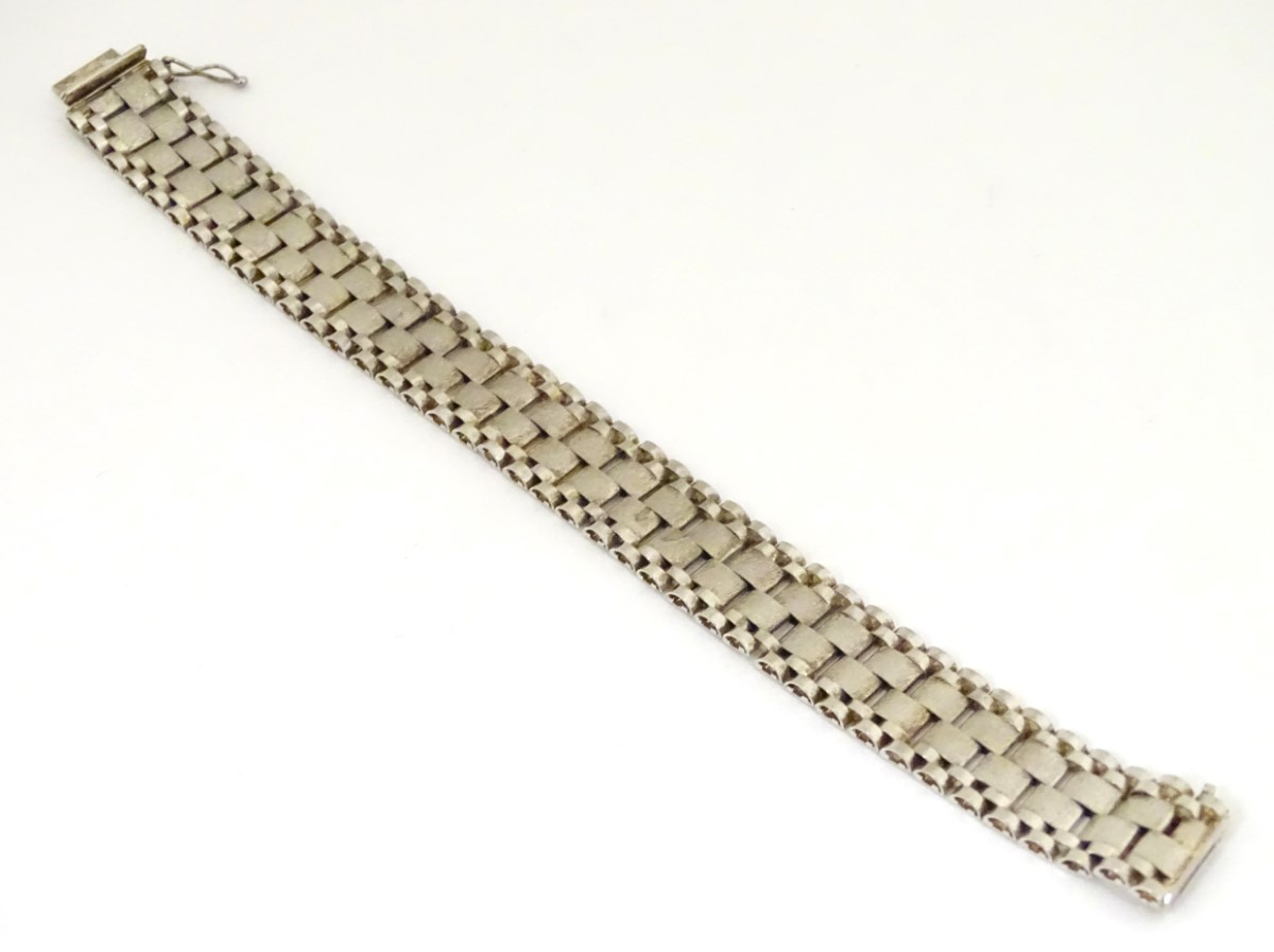 A silver bracelet of wide link strap form CONDITION: Please Note - we do not make - Image 5 of 8