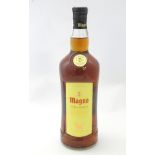 A single bottle of Magno 'solera reserva' brandy, 36% vol, 1 litre.