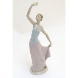 A Nao figure of a dancer, model no. 1204, 'The Dance is Over'. Approx. 13 1/4" high.