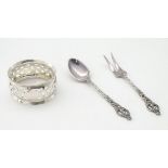 A silver napkin ring hallmarked 1927 maker Arthur Johnson Smith together with a small spoon and