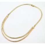 A 2-tone rose and yellow gold necklace approx 16" long CONDITION: Please Note - we