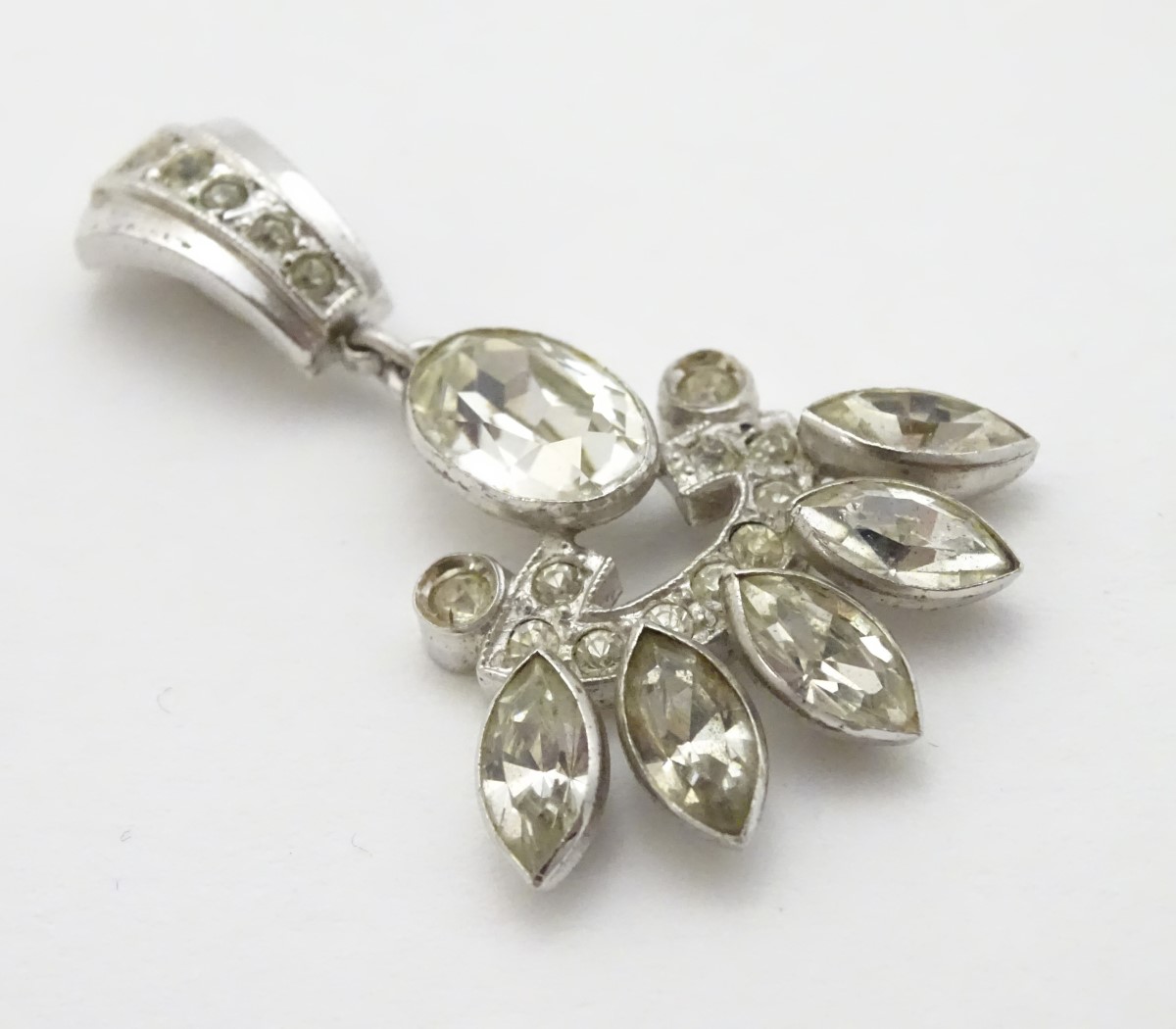 A white metal pendant set with paste stones 1 3/54" long CONDITION: Please Note - - Image 5 of 9