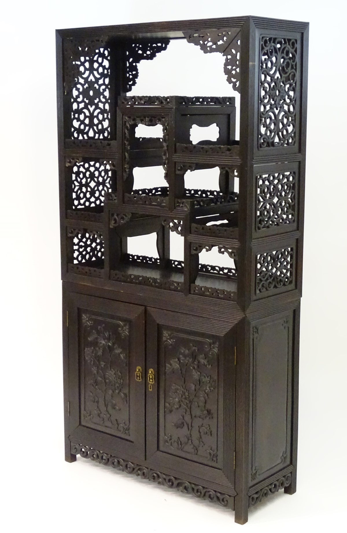 A late 19thC / early 20thC Chinese hardwood cabinet with open display shelves resting on a cupboard - Image 3 of 10