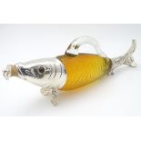 A 21stC novelty silver plated and coloured glass decanter in the form of a fish, 14" long.