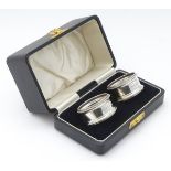 A cased pair of napkin rings hallmarked London 1935 maker EB&Co CONDITION: Please