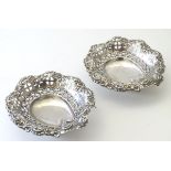 A pair of silver bon bon dishes hallmarked Chester 1897 maker Daniel George Collins.