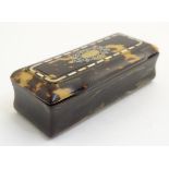 A 19thC tortoiseshell snuff box of rectangular form with white and yellow metal inlay. Approx.