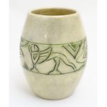 A Radford pottery barrel vase decorated with incised banded decoration depicting stylised birds and