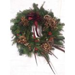 A Christmas wreath Kindly made and donated by Rosie, Wild Rose Flower Company, www.