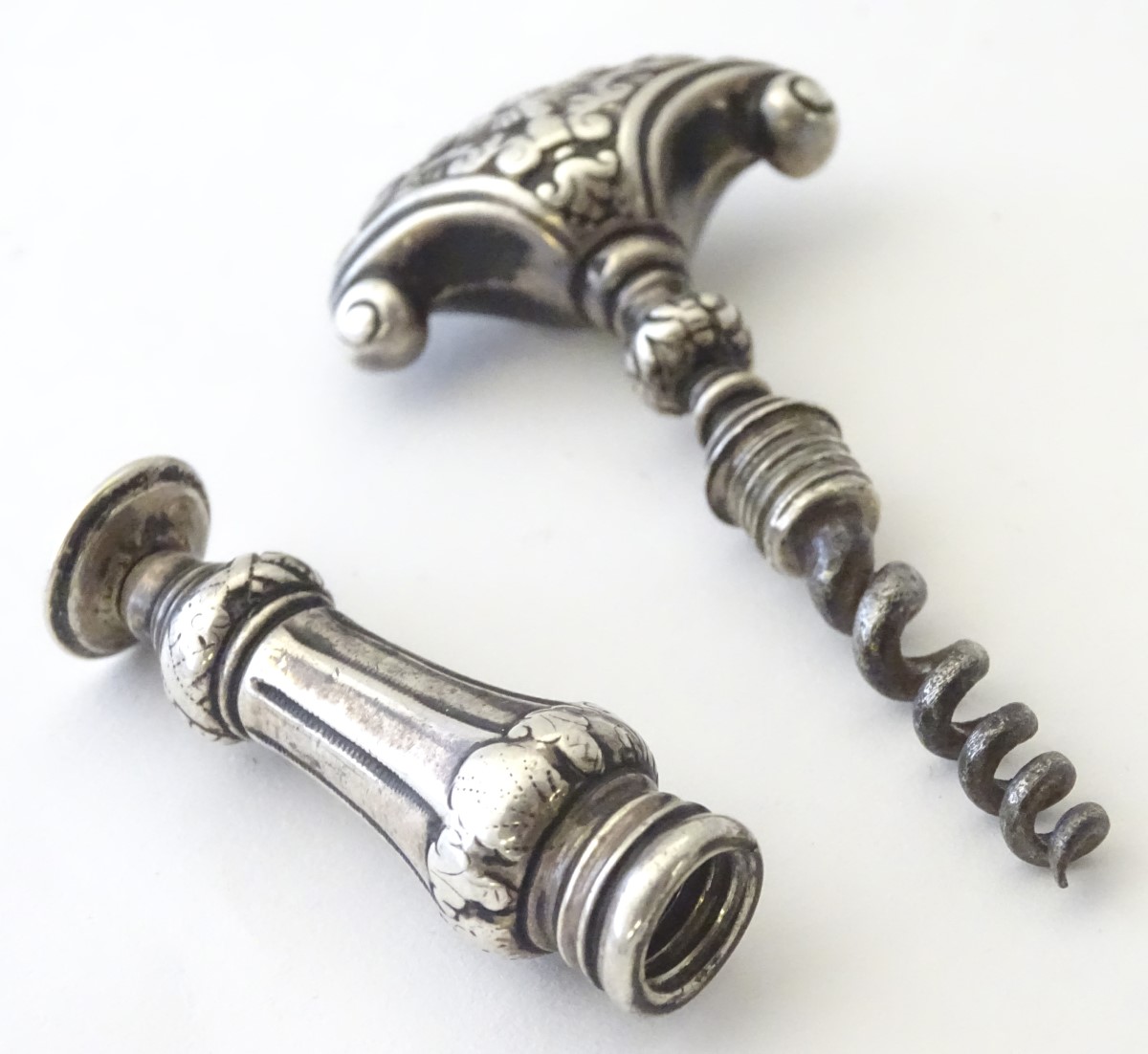 Corkscew : A 18thC Dutch white metal ( silver) corkscrew with shaped handle having acanthus - Image 8 of 10